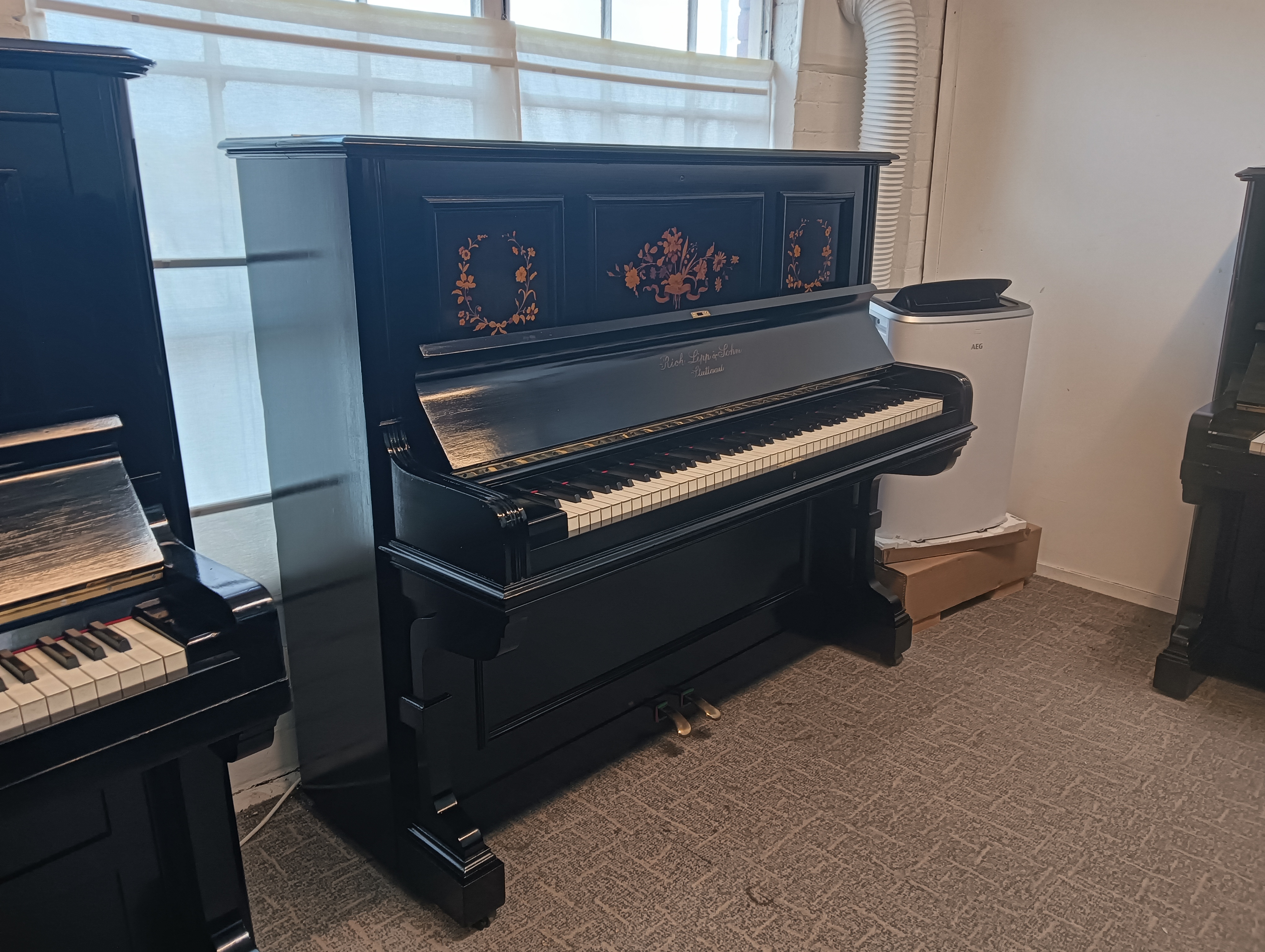 Richard Lipp, Delicately Inlaid, Ebony Repolished Piano £5,500